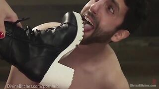 The muscular dominatrix beats and dominates her slaveboy