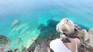 The cute girlfriend passionately sucks her ex-boyfriend's big dick on the beach
