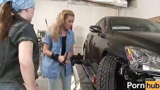 A lesbian garage scene with intense pussy licking and eating, featuring a redhead