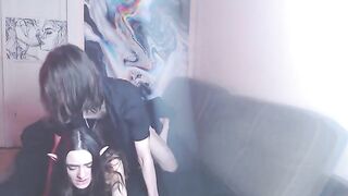 A couple enjoys intimate moments on the couch, creating a steamy homemade scene