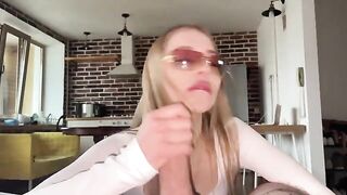 Pretty woman in glasses gets her face covered with sperm after hard sex