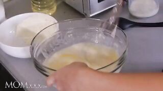 The petite stepdaughter gets spanked and eaten out by her sexy stepmom in the kitchen