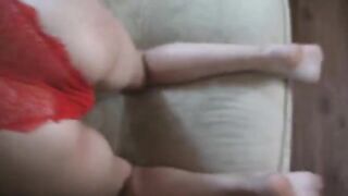 A cute girl is spanking herself and talking about it with someone