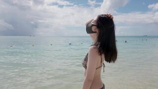 A petite Chinese model enjoys romantic sex on a beautiful island