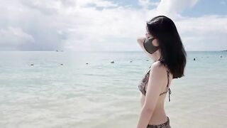 A petite Chinese model enjoys romantic sex on a beautiful island