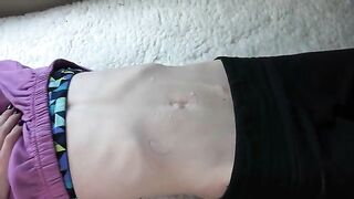 A beautiful woman got a lot of sperm on her belly button in a hot scene