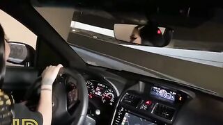 Cute slender girl fucked by a guy in the car in the parking lot