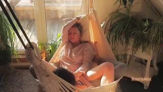A couple enjoys a passionate and sensual encounter on a sunny day