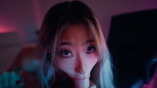 Sexy Asian teen Raya Steele massages cock with her throat in a hot scene