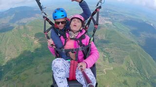 Sexx Sexxx has an intense orgasm while paragliding in the sky, a wild ride