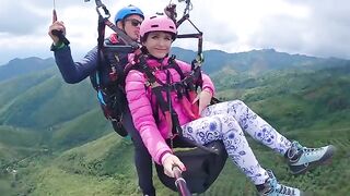 Sexx Sexxx has an intense orgasm while paragliding in the sky, a wild ride