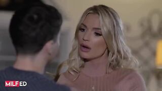 A stepmom is making a mess on her stepson’s cock in the living room