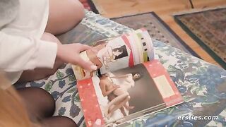Lesbian beauties study the Kama Sutra before engaging in passionate play