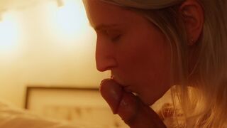 A blonde gives her husband a sensual massage and they have sex
