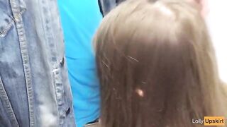 Risky Public Blowjob: A petite schoolgirl gets caught in a daring act in a shop changing room
