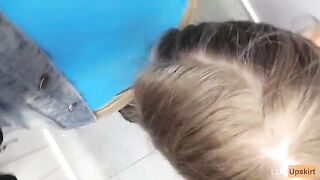 Risky Public Blowjob: A petite schoolgirl gets caught in a daring act in a shop changing room