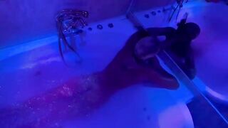 The blonde plays with sex toys in the bathroom and imitates a blowjob
