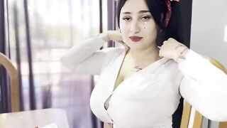 A hot girl is trying to pass her math exam by any means necessary