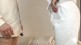 A patient with erection problems is visited by a nurse in an exclusive scene