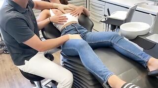 A hot doctor examined the girl's boobs instead of teeth