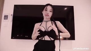 An Asian girl in a black dress was fucked and made to squirt
