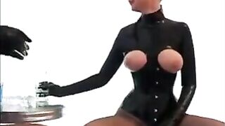 Two girls in latex suits couldn't resist their sexual desires