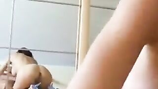 A young couple has fun at home, the girl sucks her boyfriend's dick well