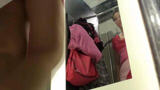 A pervert guy spied on a girl in the locker room of the shop