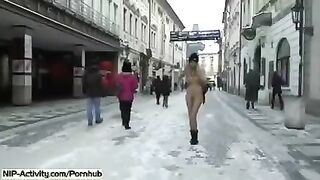 The hot student bares her boobs and ass on the city streets