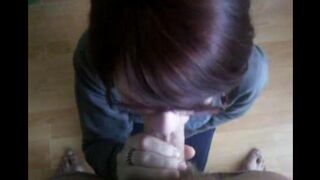 Girl sank to the ground and started sucking a guy’s long penis
