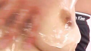 Oiled Japanese boobs with fingered member in between