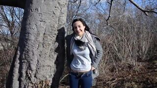 A girl has sex with a stranger in the forest using a dildo
