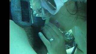 A guy has sex with a girl with a hairy pussy under the water