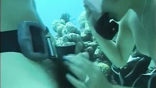A guy has sex with a girl with a hairy pussy under the water