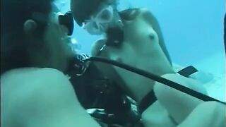A guy has sex with a girl with a hairy pussy under the water