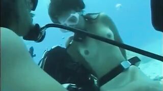 A guy has sex with a girl with a hairy pussy under the water