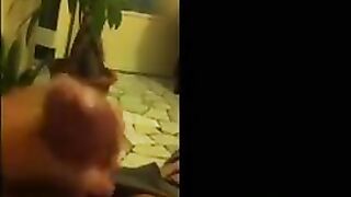 The girl removes her panties on the phone and rubs herself