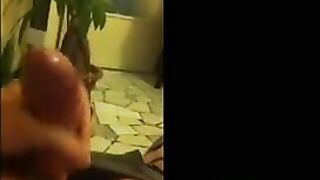 The girl removes her panties on the phone and rubs herself