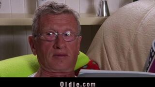 A young girl is having fun with older men in this steamy scene