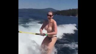 Topless beauty riding on the water skiing is very exciting, you should see it!