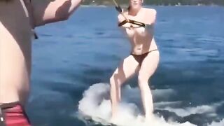Topless beauty riding on the water skiing is very exciting, you should see it!