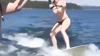 Topless beauty riding on the water skiing is very exciting, you should see it!