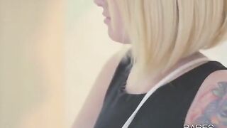 A sexy blonde with tattoos plays with herself and gets orgasm