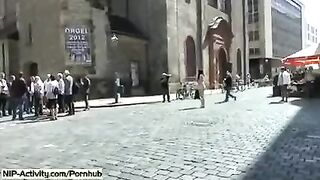A girl showed her pussy to all passers-by on the street