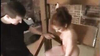 BDSM sex with a hot woman in a rope, subjected to sadomaso