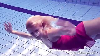 Babe Helen has a swim in the pool without any clothes on