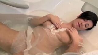 Brunette solo masturbation in shower steam