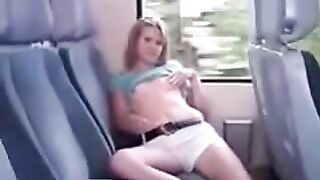 On the bus in the back seat, lifting the skirt started to iron her pussy
