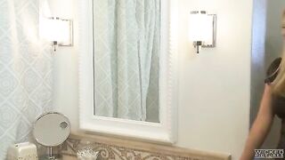 A husband has sex with his wife in the bathroom, she is very glad