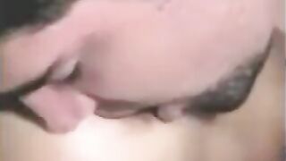 A guy has sex with his girlfriend using a strapon